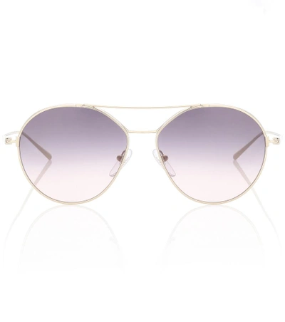 Shop Prada Aviator Sunglasses In Gold