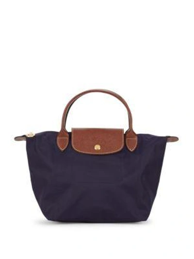 Shop Longchamp Le Pilage Zipped Handbag In Bilberry