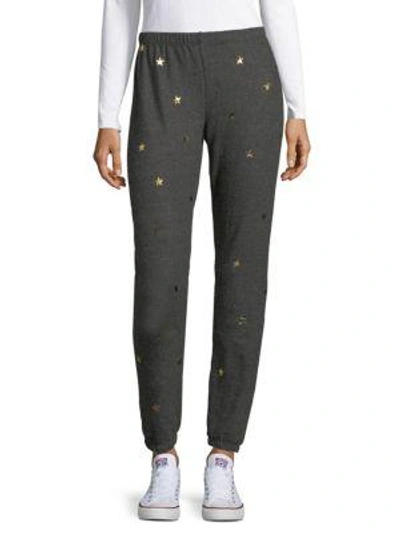 Shop Wildfox Metallic Star Track Pants In Dirty Black