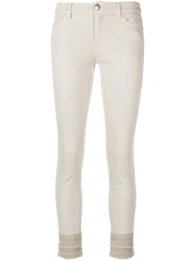 embroidered hem skinny trousers