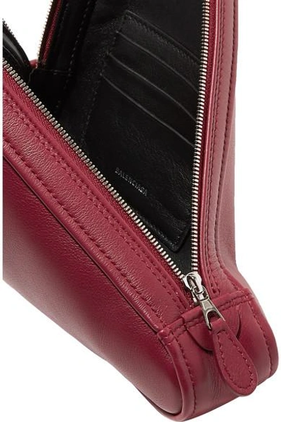 Shop Balenciaga Triangle Printed Leather Pouch In Burgundy