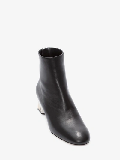 Shop Alexander Mcqueen Sculpted Heel Ankle Boot In Black