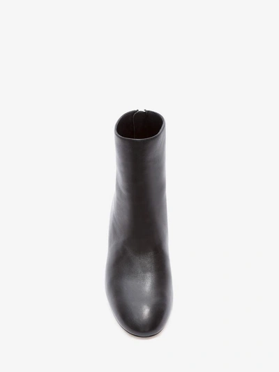 Shop Alexander Mcqueen Sculpted Heel Ankle Boot In Black