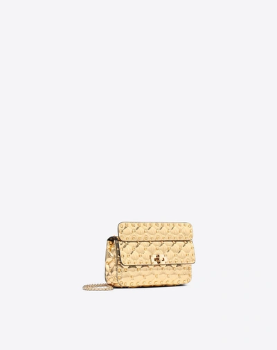 Shop Valentino Small Metallic Rockstud Spike Bag In Gold