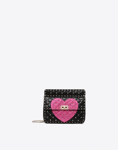 Shop Valentino Garavani Medium Crystal Heart Spike Bag In Black