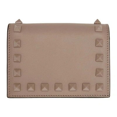 Shop Valentino Pink  Garavani Small Rockstud French Flap Wallet In P45 Poudre