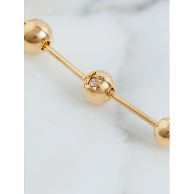 Shop Burberry Crystal Charm Gold-plated Drop Earrings In Light Gold