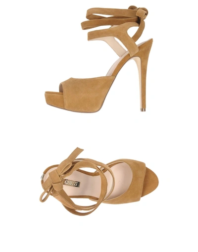 Shop Guess Sandals In Brown