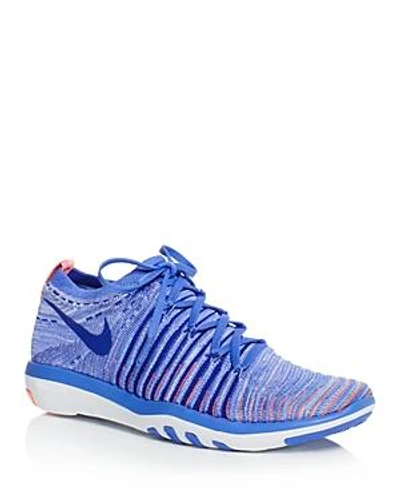 Shop Nike Women's Free Transform Flyknit Lace Up Sneakers In Medium Blue/concord Lava Glow