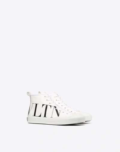 Shop Valentino Garavani Uomo High-top Canvas Sneaker With Vltn Logo In White/ Black