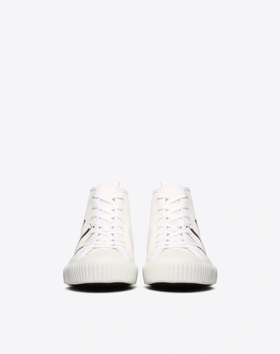 Shop Valentino Garavani Uomo High-top Canvas Sneaker With Vltn Logo In White/ Black