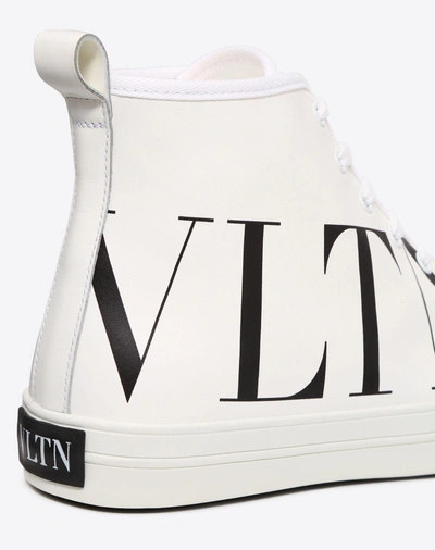 Shop Valentino Garavani Uomo High-top Canvas Sneaker With Vltn Logo In White/ Black