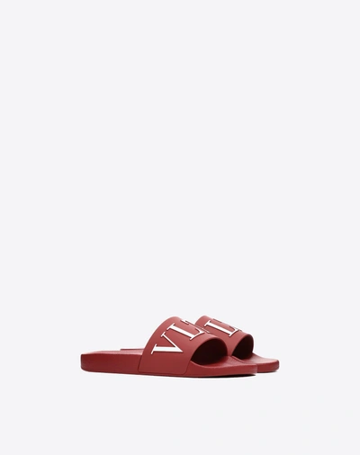 Shop Valentino Garavani Uomo Vltn Rubber Slider Sandal In Ruby