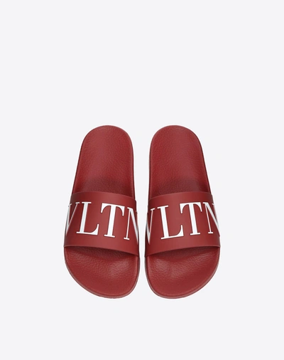 Shop Valentino Garavani Uomo Vltn Rubber Slider Sandal In Ruby