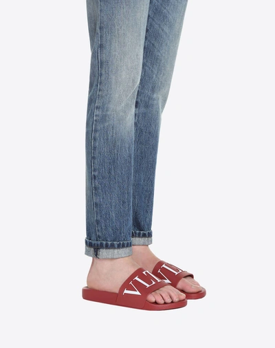 Shop Valentino Garavani Uomo Vltn Rubber Slider Sandal In Ruby