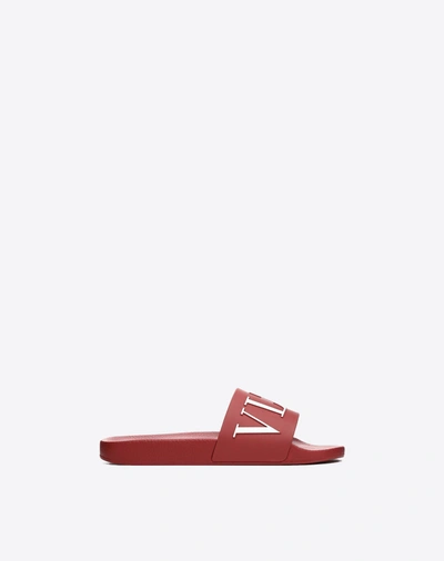 Shop Valentino Garavani Uomo Vltn Rubber Slider Sandal In Ruby