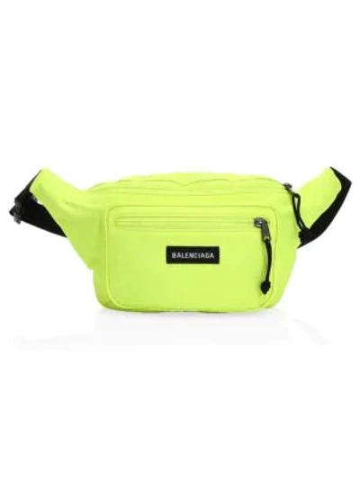 Shop Balenciaga Explorer Belt Bag In Yellow