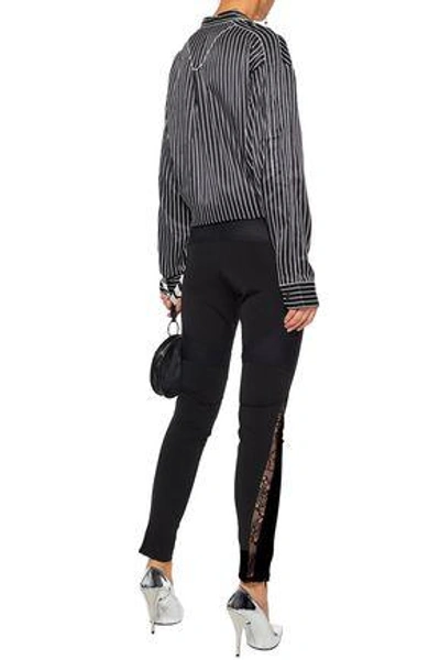 Shop Versace Woman Mesh-paneled Lace-trimmed Cotton-blend Twill Skinny Pants Black