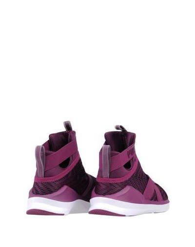 Shop Puma Sneakers In Purple