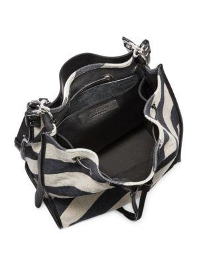 Shop Jw Anderson Striped Suede Drawstring Bag In Black White