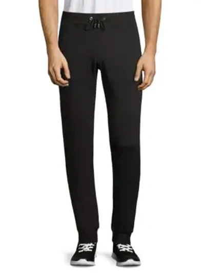 Shop Versace Jogger Pants In Black