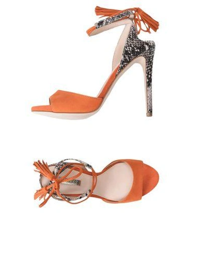 Shop Guess Sandals In Orange