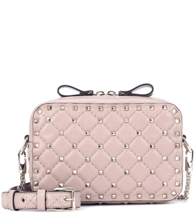 Shop Valentino Rockstud Spike Leather Crossbody Bag In Pink