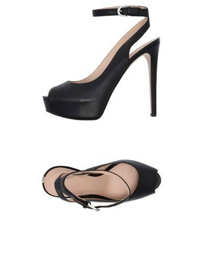 Shop Guess Sandals In Black