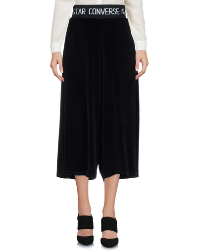 Shop Converse Cropped Pants & Culottes In Black