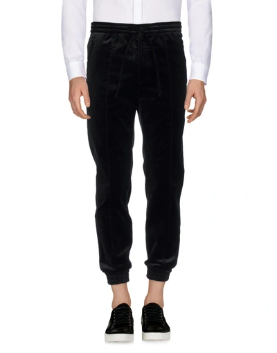 Shop Juunj Casual Pants In Black