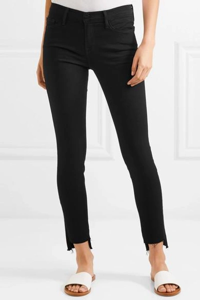 Shop Frame Le Skinny De Jeanne Raw Stagger Mid-rise Jeans In Black