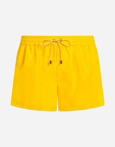 Shop Dolce & Gabbana Short Swimming Trunks With Pouch Bag In Yellow