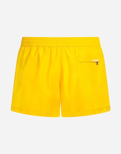 Shop Dolce & Gabbana Short Swimming Trunks With Pouch Bag In Yellow