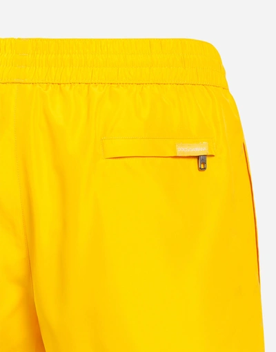 Shop Dolce & Gabbana Short Swimming Trunks With Pouch Bag In Yellow