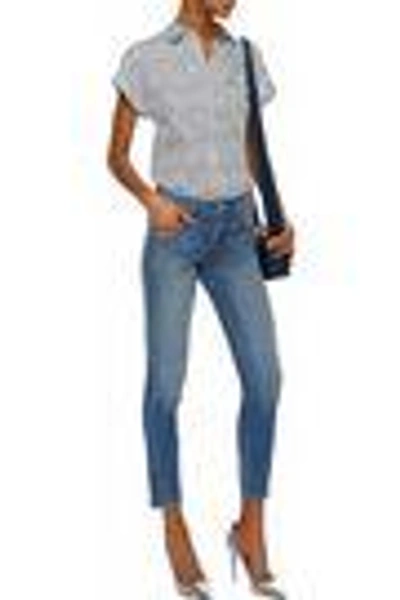 Shop Amo Twist Distressed Mid-rise Skinny Jeans In Mid Denim