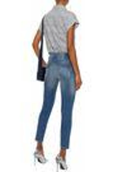 Shop Amo Twist Distressed Mid-rise Skinny Jeans In Mid Denim