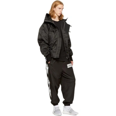 Shop Ueg Black Hooded Flyers Jacket