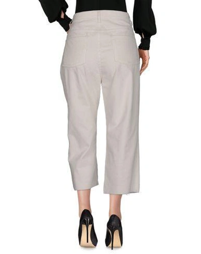 Shop Haikure Cropped Pants & Culottes In White