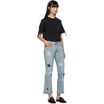 Shop Stella Mccartney Blue Stars Skinny Kick Flare Jeans In 4110 Da Def