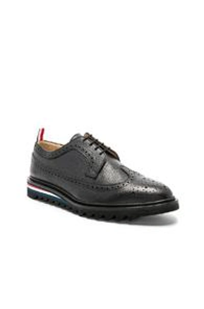 Shop Thom Browne Pebble Grain Classic Longwing Brogue With Threaded Rubber Sole In Black