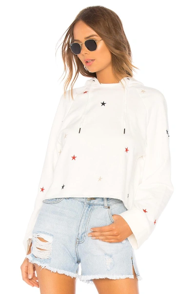 Shop Pam & Gela Crop Hoodie Sweatshirt With Stars In White