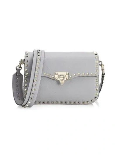 Shop Valentino Rockstud Leather Shoulder Bag In Pastel Grey