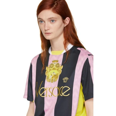 Shop Versace Pink And Black Stripe Logo Football T-shirt In A3029 Pink