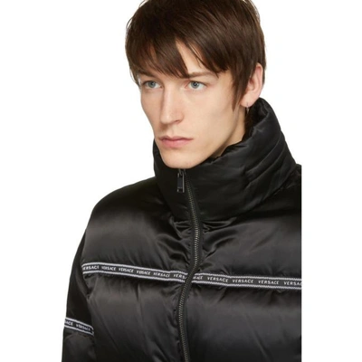 Shop Versace Black Down Logo Tape Puffer Jacket In A008 Black