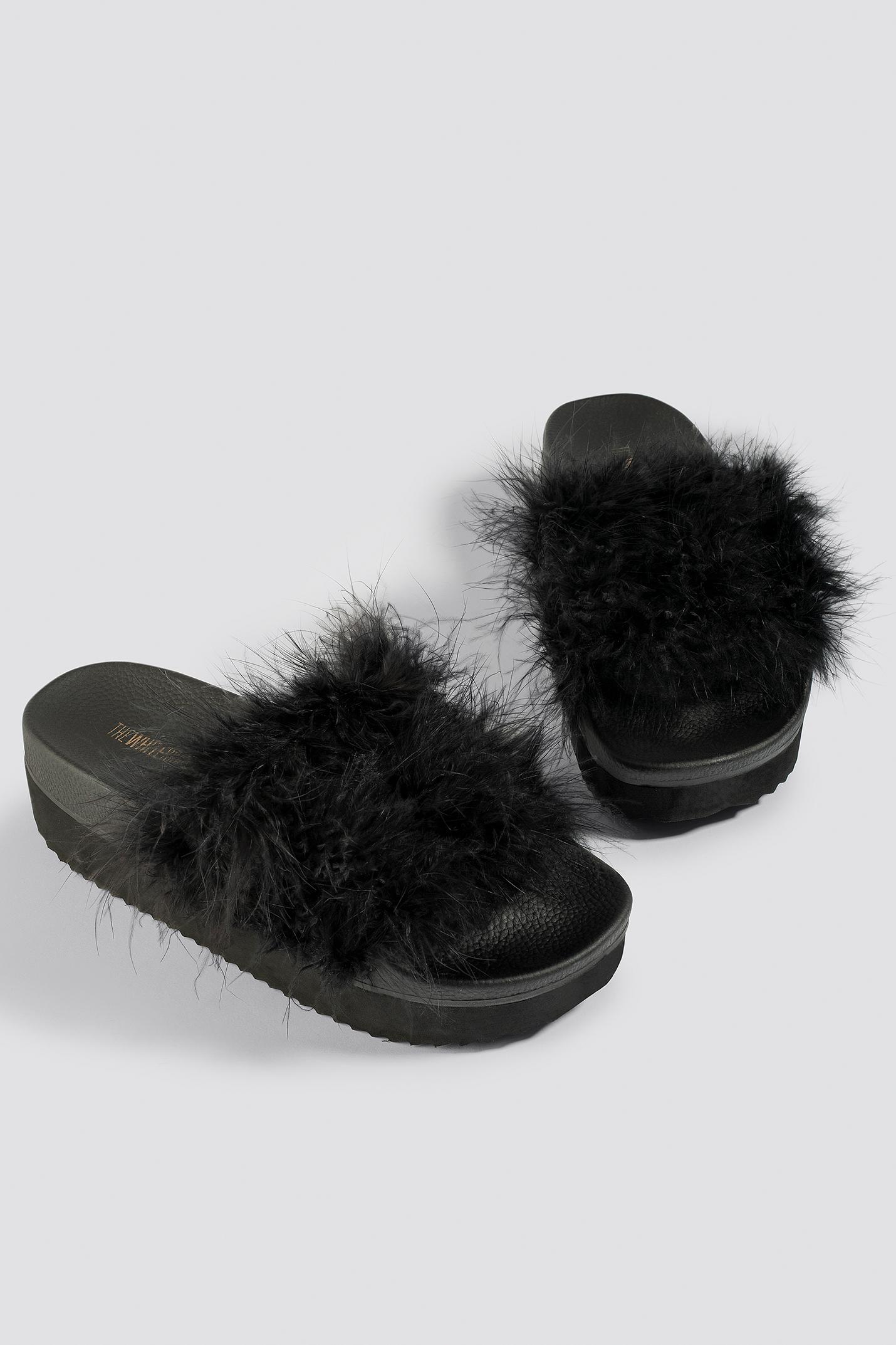 slippers the white brand