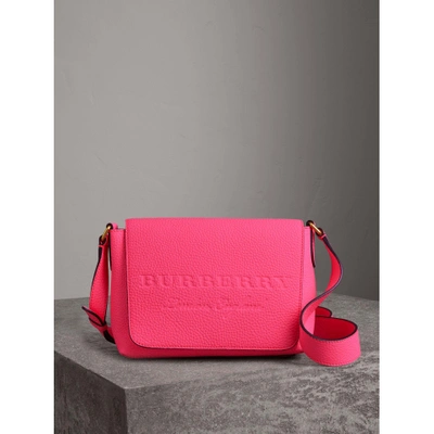 Shop Burberry Small Embossed Neon Leather Messenger Bag In Neon Pink