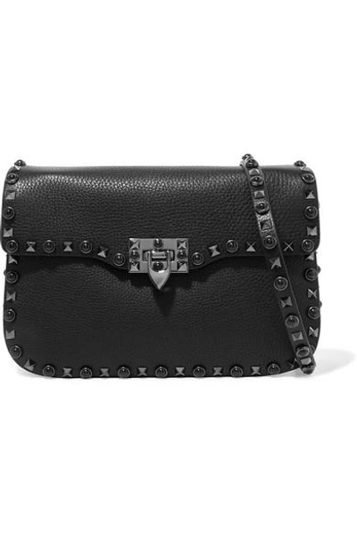 Shop Valentino Garavani The Rockstud Rolling Textured-leather Shoulder Bag In Black