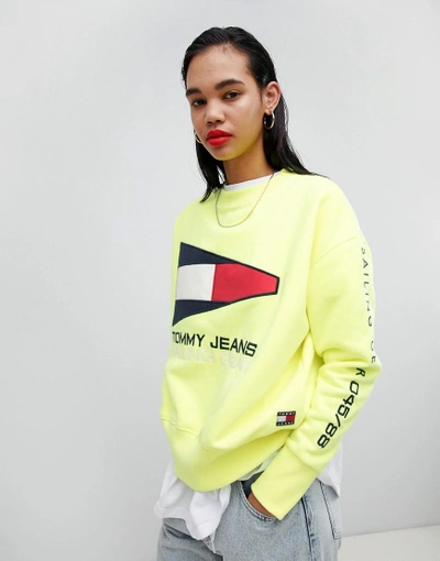 Shop Tommy Jeans Tommy Jean 90s Capsule 5.0 Sailing Flag Logo Sweatshirt - Yellow