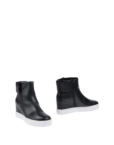 Shop Dkny Ankle Boot In Black