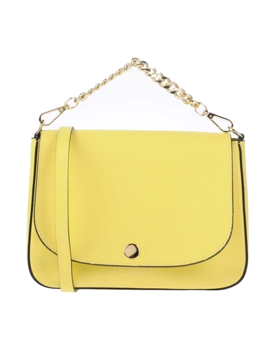 Shop Avenue 67 Handbags In Yellow